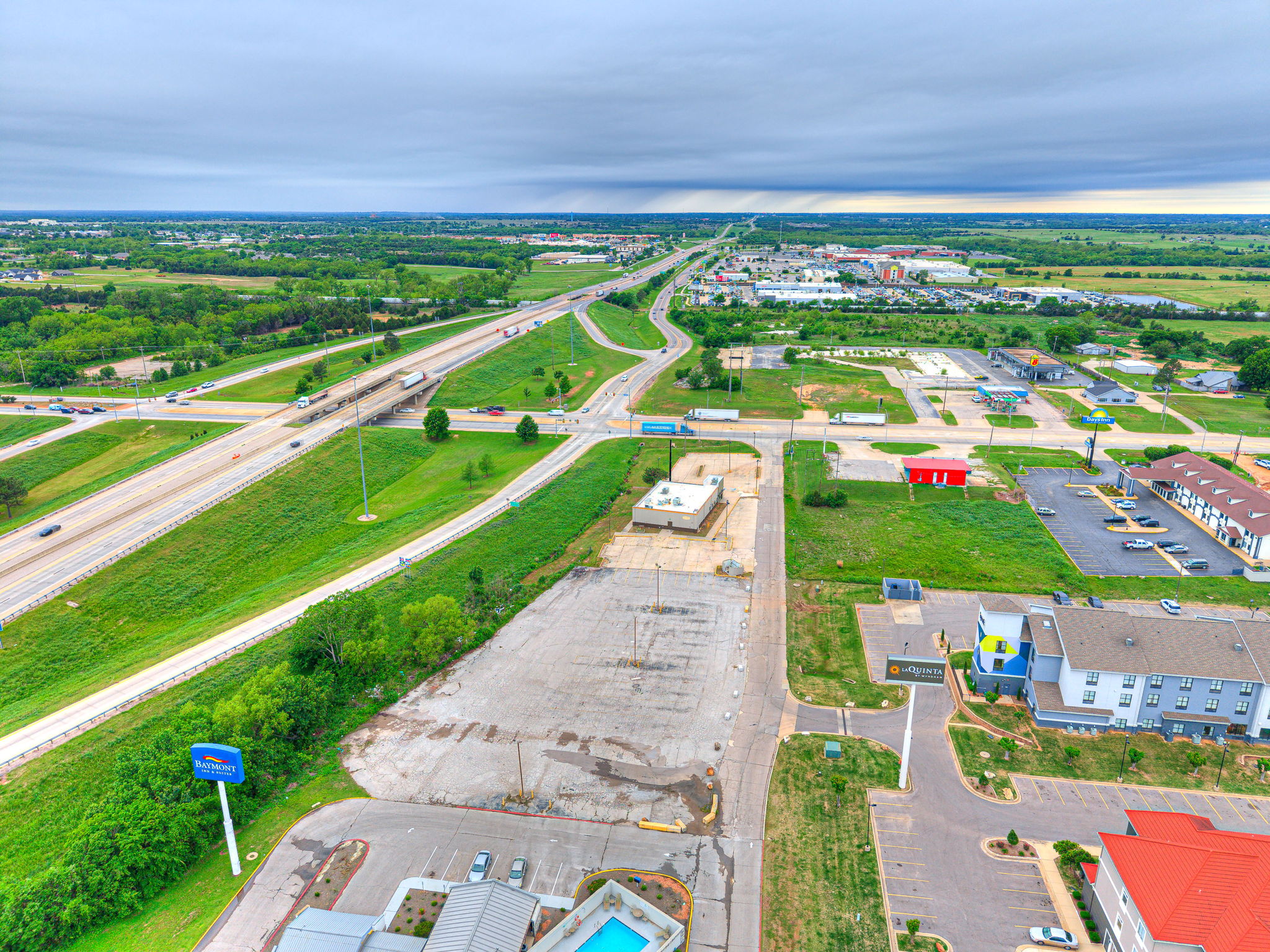 Aerial view of the vacant property beside La Quinta, Baymont and Days Inn at the I-40 interchange
