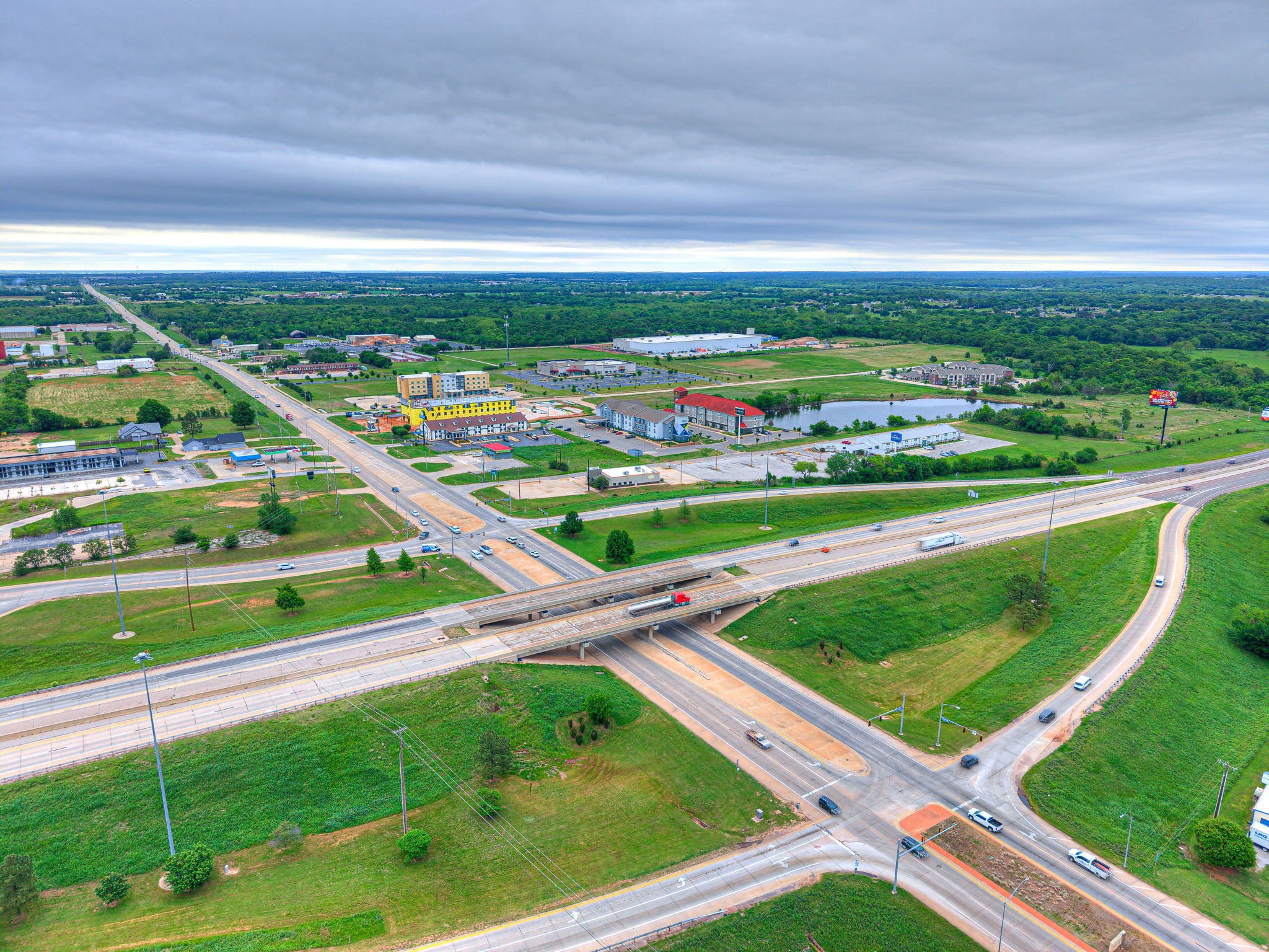 Aerial of the I-40 and SH-18 interchange with traffic on the overpass